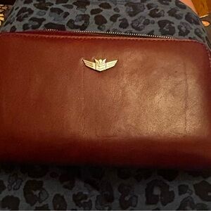 Consuela Brown Leather Wallet. Never been used. Like new.